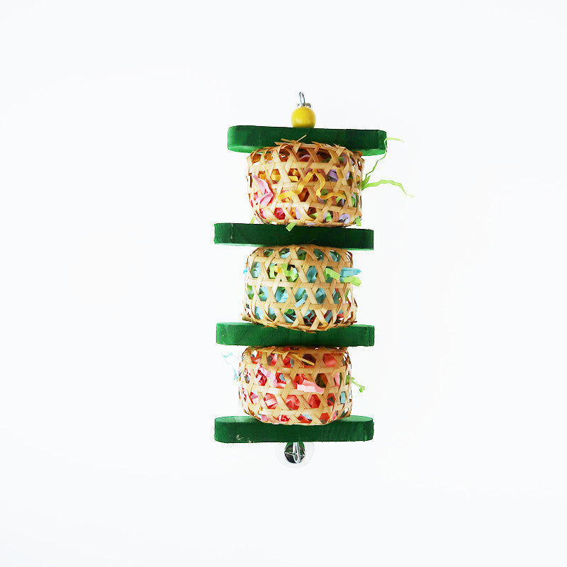 Hanging bird gnaw toy with woven paper cubes, green rings, and a yellow hanging bead