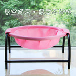 Pink free-standing pet hammock bed with breathable mesh and black metal base
