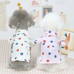 Light pink pet shirt with ruffle sleeves and red/blue mushroom pattern for dogs