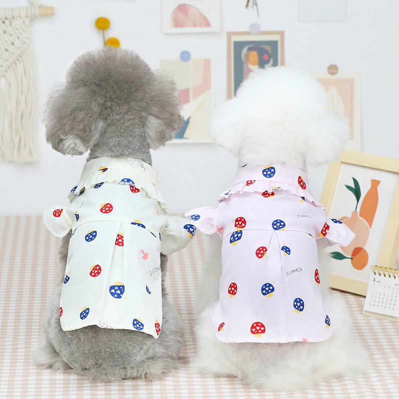 Light pink pet shirt with ruffle sleeves and red/blue mushroom pattern for dogs