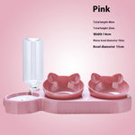 Pink pet feeding station with auto water dispenser and two raised food bowls