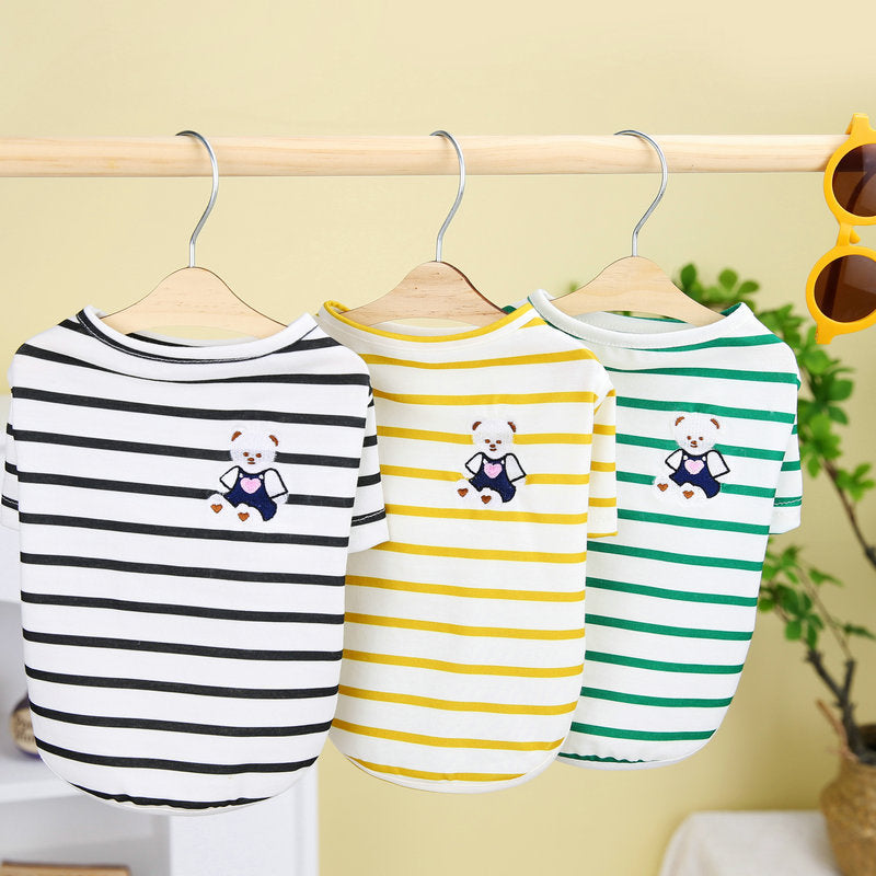 Small dog t-shirts on hangers, striped black, yellow, and green with bear graphic