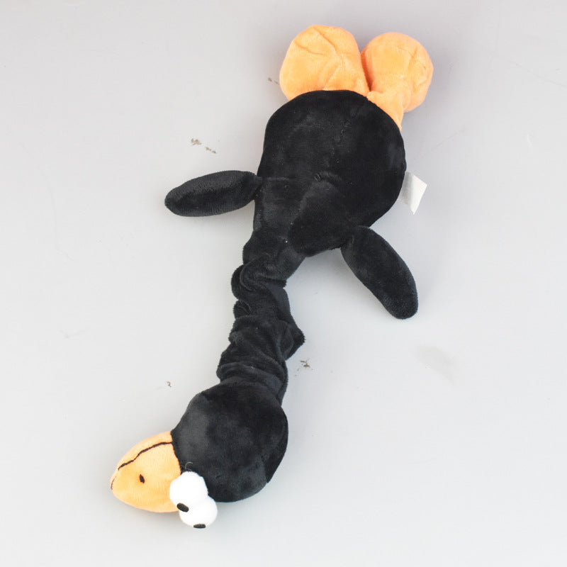 Plush bite-resistant dog toy with squeaker; black long worm with orange ear accents.