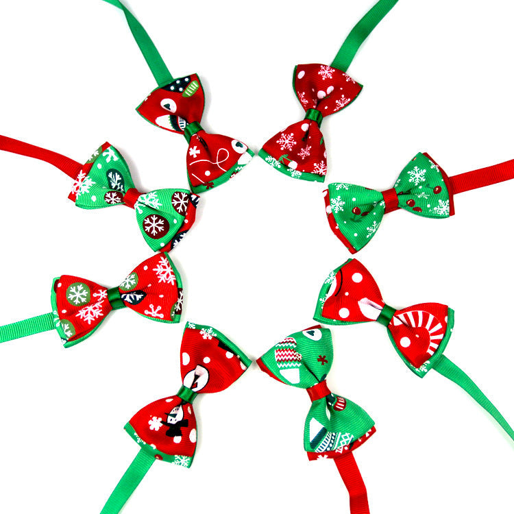 Assorted Christmas bow ties for pets with red and green holiday prints on bands