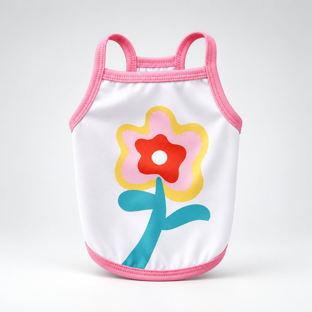 White pet tank top with pink trim and colorful flower graphic centered on the front.