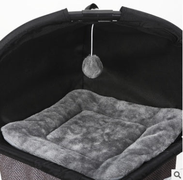 Cat climbing tree cushion bed with gray plush insert under arched fabric cover.