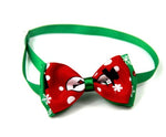 Christmas bow tie for pets with green neck strap and red animal-face bow