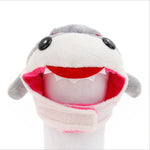 Shark plush pet hat with dark eyes and red inner mouth trim