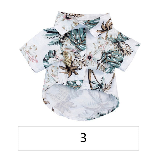 Hawaiian pet shirt, light base with teal and tan tropical leaf prints, button front