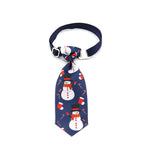 Blue Christmas pet tie with snowman and Santa patterns, clip-on strap