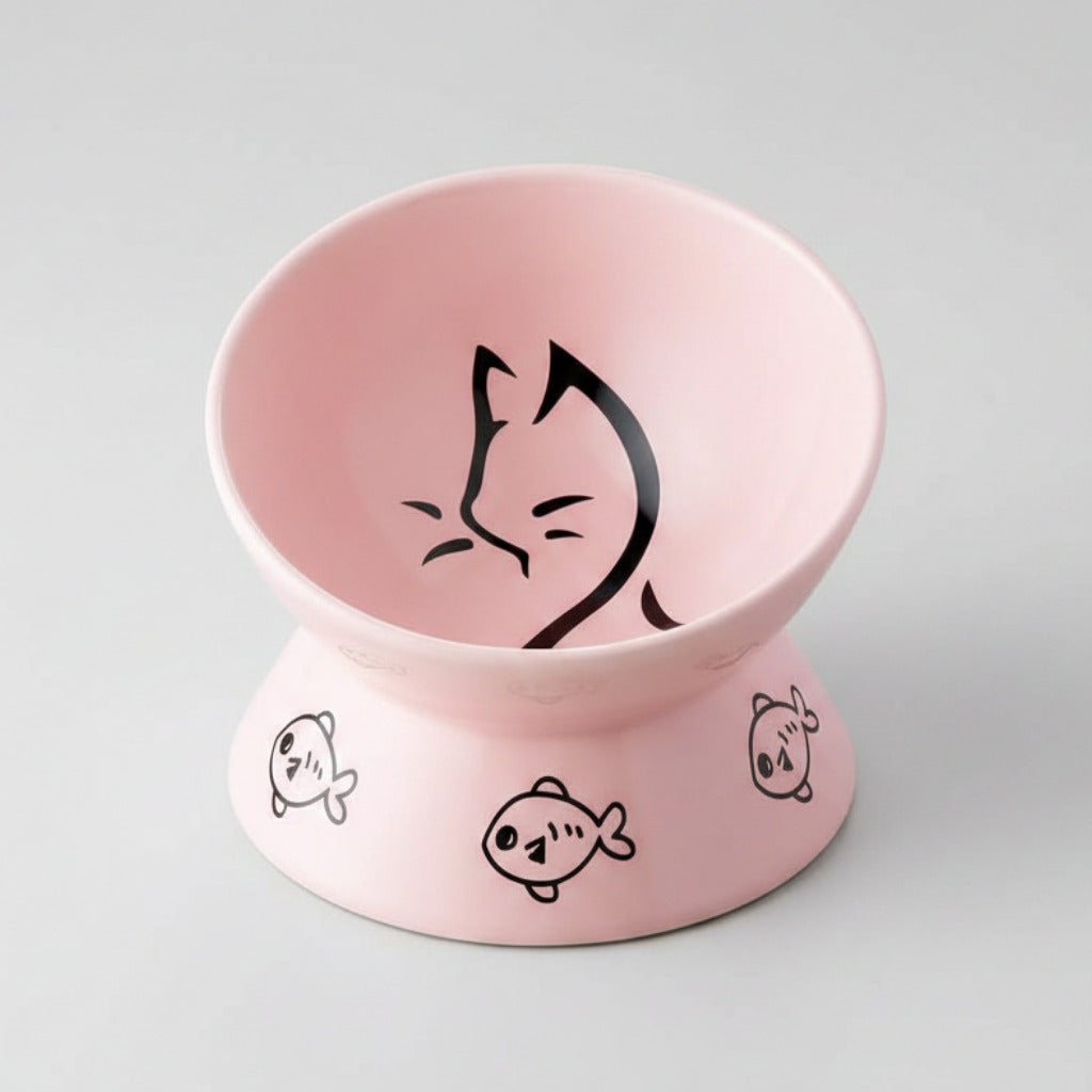 Pink raised tilt ceramic cat bowl with cat-face illustration and fish motifs