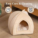 Beige pet tent bed with arched entrance and plush cushion inside