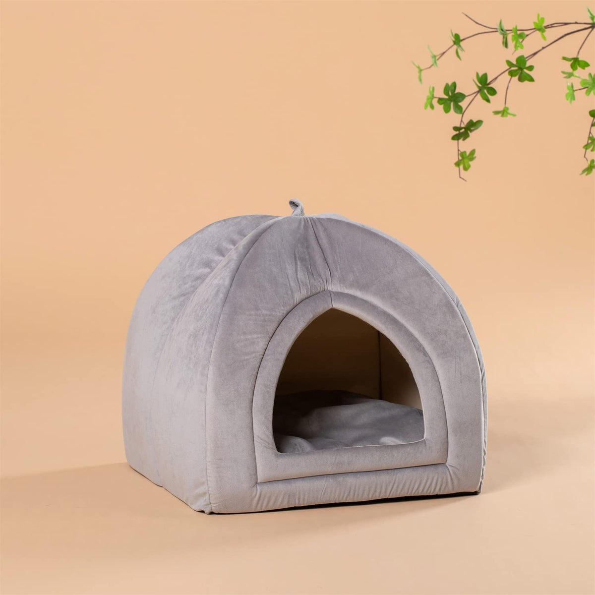 Gray soft cat bed cushion with arched entrance and plush padding, cozy pet house