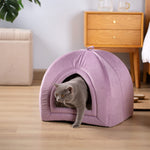 Purple arched cat bed cushion with plush rim and open doorway; cat relaxing inside