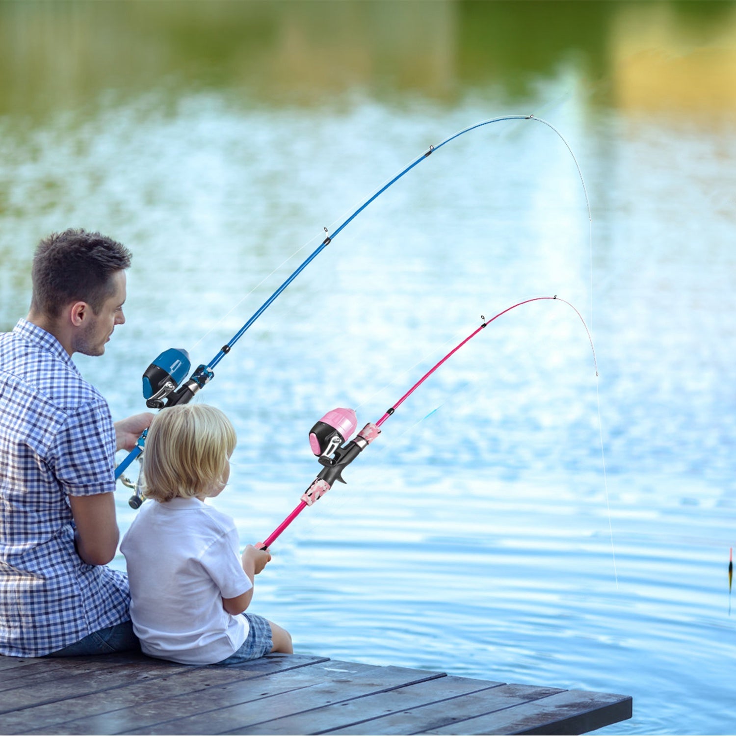 Pair of kids fishing rods with spincast reels, blue and pink poles