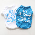 Blue and white cotton dog summer vest with paw and “My dog Thinks I’m Awesome” print