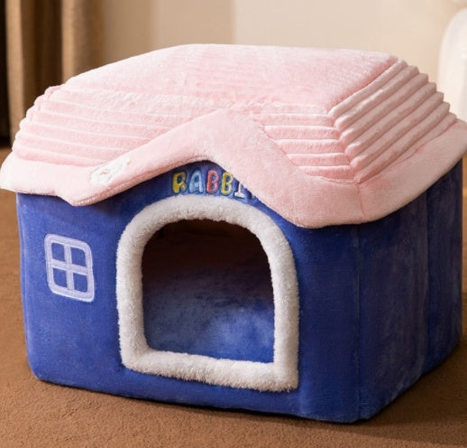 Blue and pink enclosed pet house bed with plush arched door and top cushion