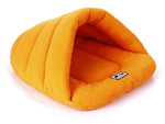 Orange pet cozy cave sleeping bag with paw patch interior view