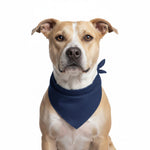 Dog pet bandana with navy blue triangle bib on tan dog