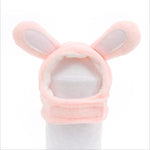 Pink rabbit plush pet hat with floppy ears and soft hood