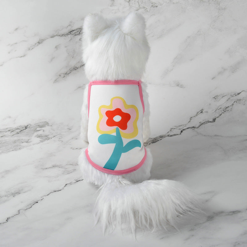 Cute pet tank top with white fur and pink trim, yellow flower-themed cartoon graphic on front.