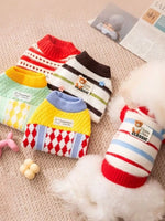Knitted pet sweater set with striped and graphic patterns, ribbed red collar, pullover