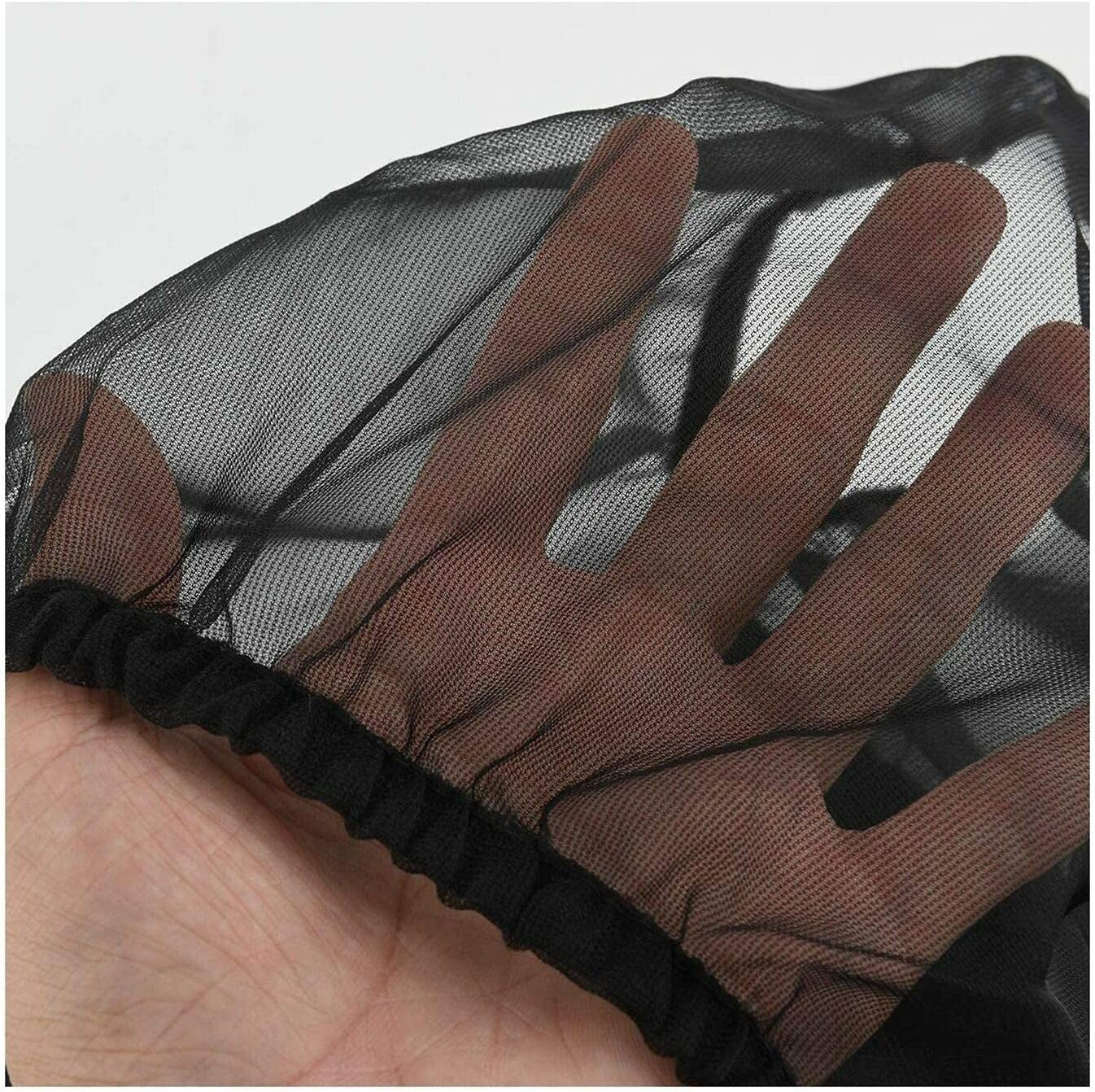 Black mesh seed catcher cover with elastic hem, held in hand