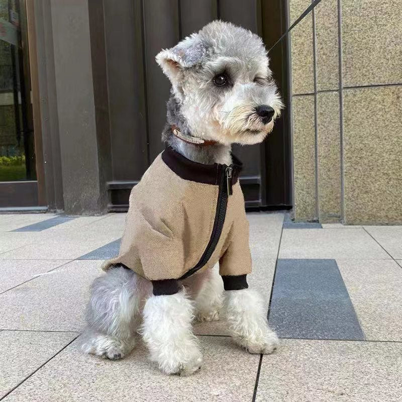 Khaki pet winter jacket hoodie with zip front and dark ribbed cuffs, on a sitting dog.