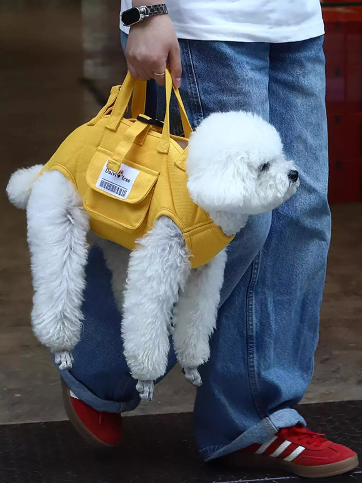 Gold portable pet carrier harness with shoulder strap and small front pocket