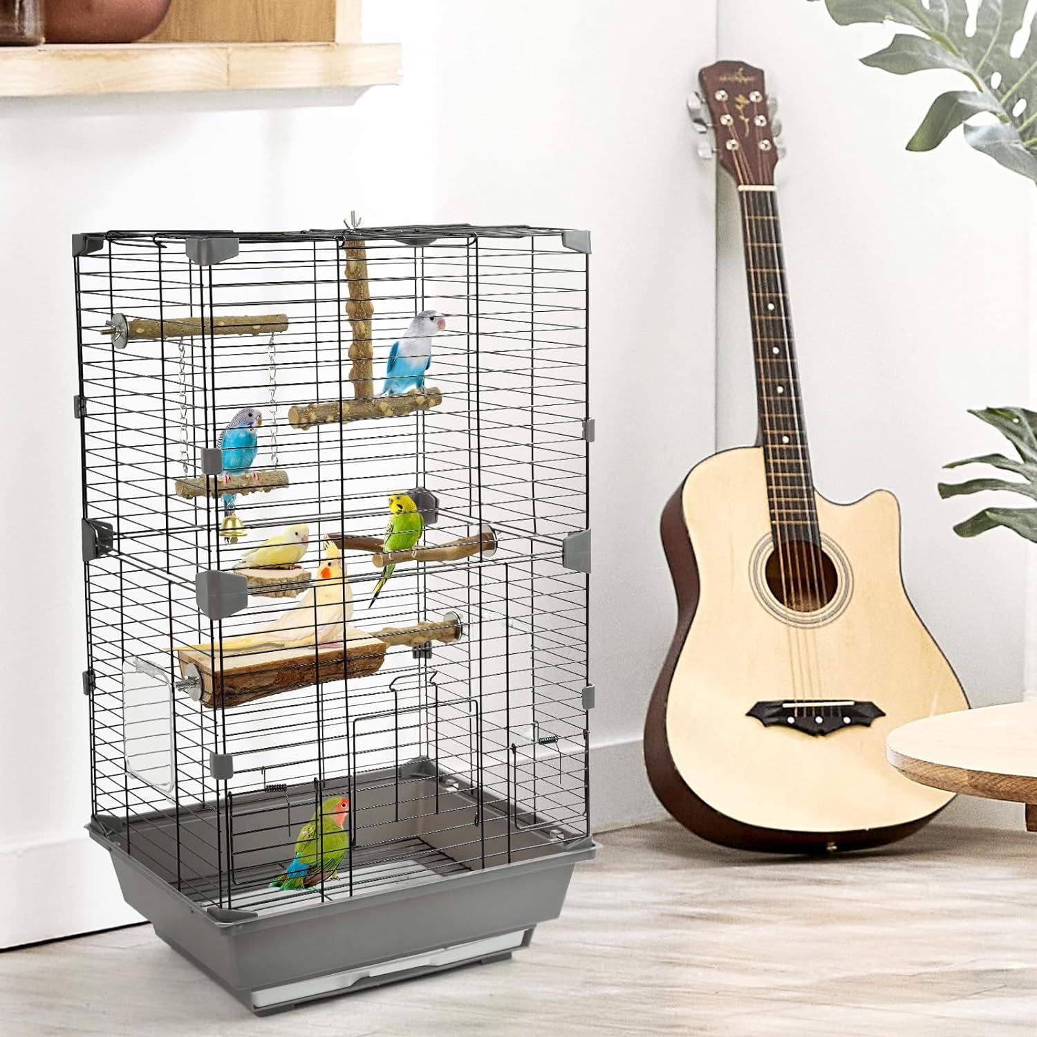 Natural wood bird perch set mounted in a wire cage with several branch perches