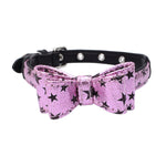 Pink starry bow on black pet collar with silver studs and buckle hardware