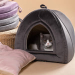 Dark gray arched cat bed cushion with plush lining; cat inside the doorway