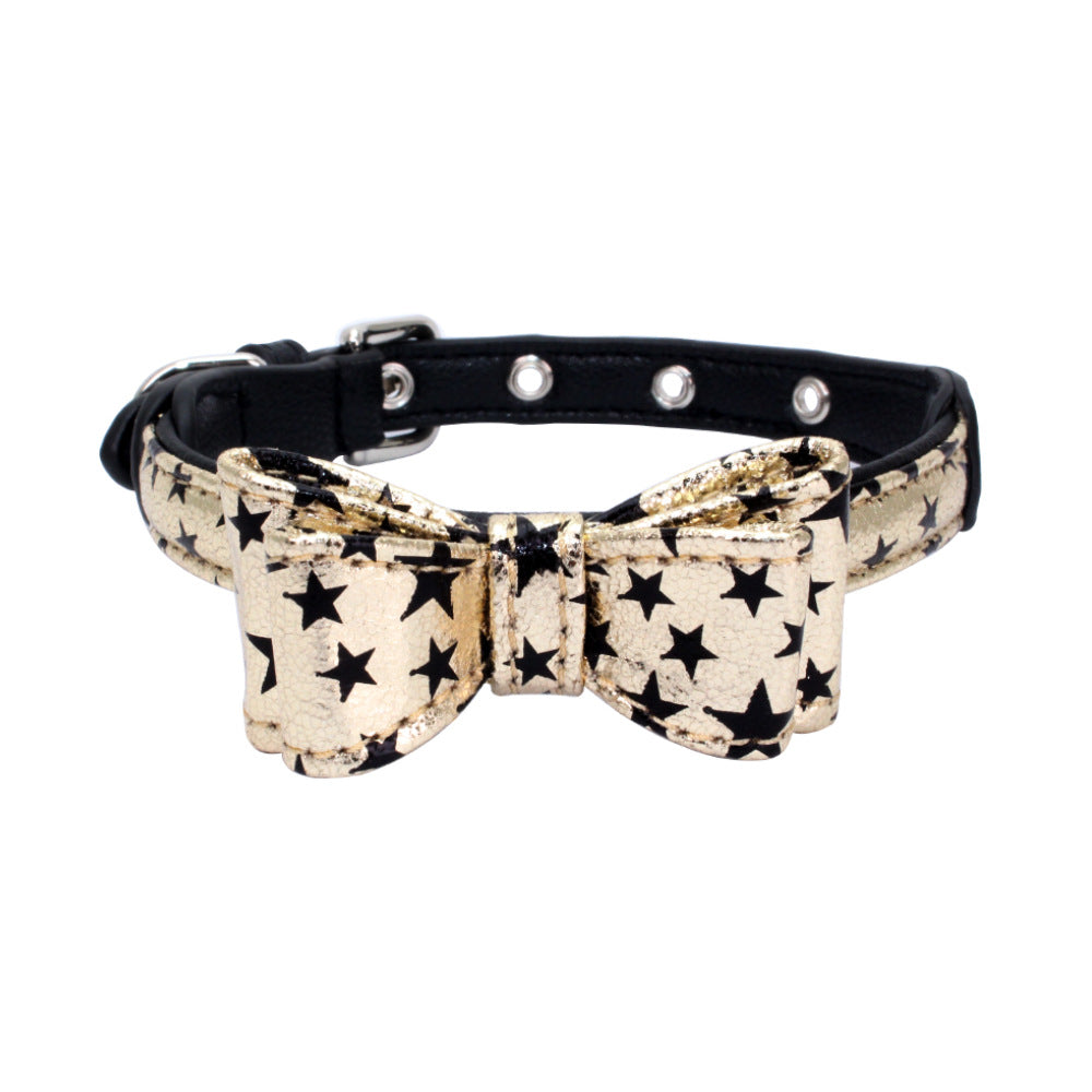 Pet collar with beige star print strap and bow, black stars, silver grommet studs