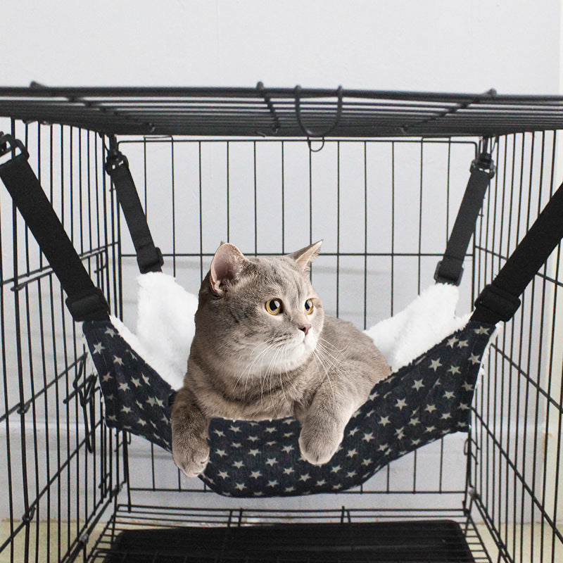 Cat cage hanging hammock bed with dark star fabric, plush white lining, and straps