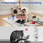 Elevated stainless steel pet bowl on black stand with red-and-white striped sides