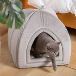 Light grey pet tent bed with arched opening, with gray cat inside