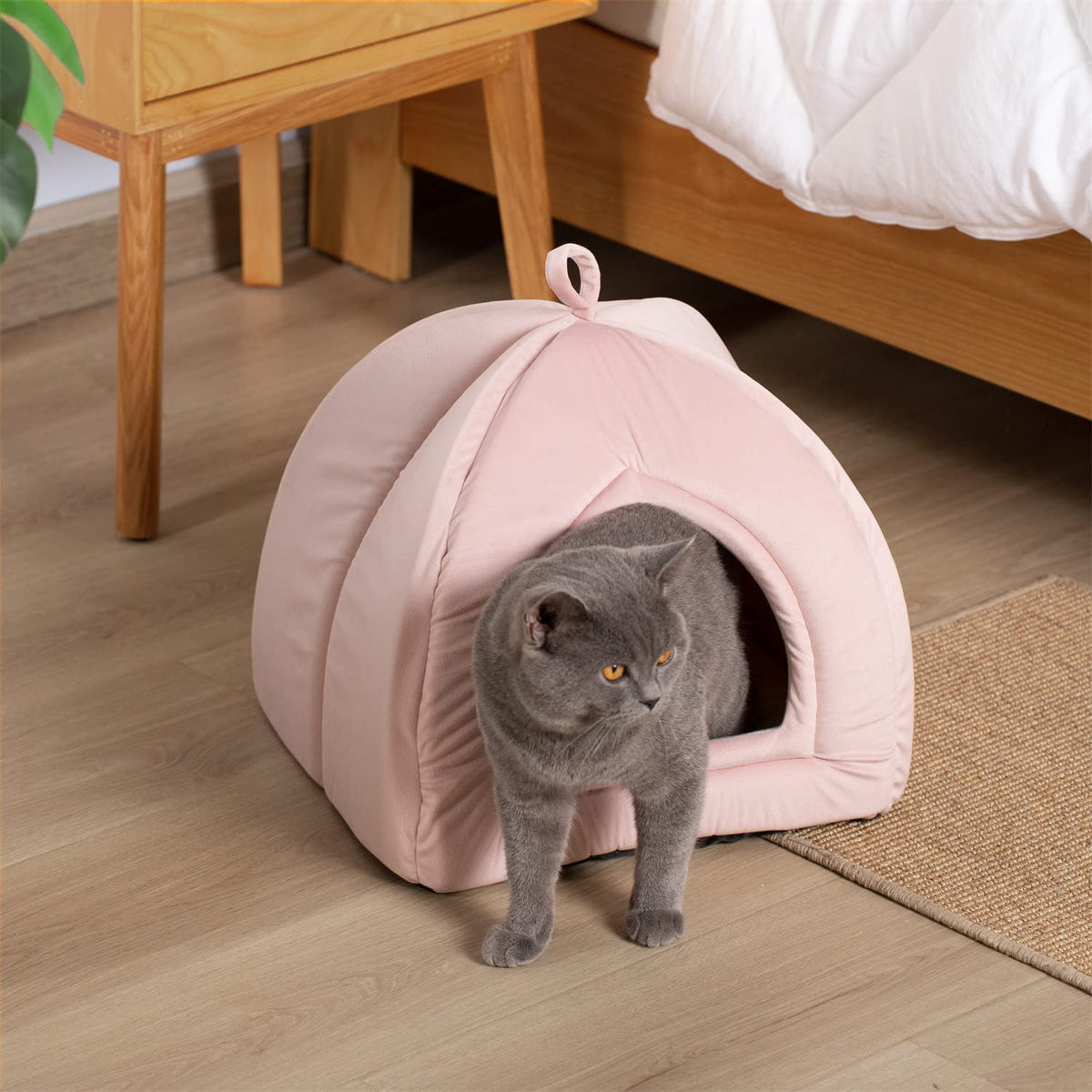 Soft cat bed cushion tent with circular sides and front opening, pale pink