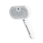 Pet steam brush with white handle and oval textured cleaning head