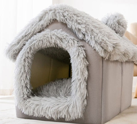 Light gray enclosed pet house bed with shaggy fringe roof and arched door opening