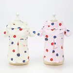 Cream and light pink pet shirts with red/blue mushroom print and ruffle collars
