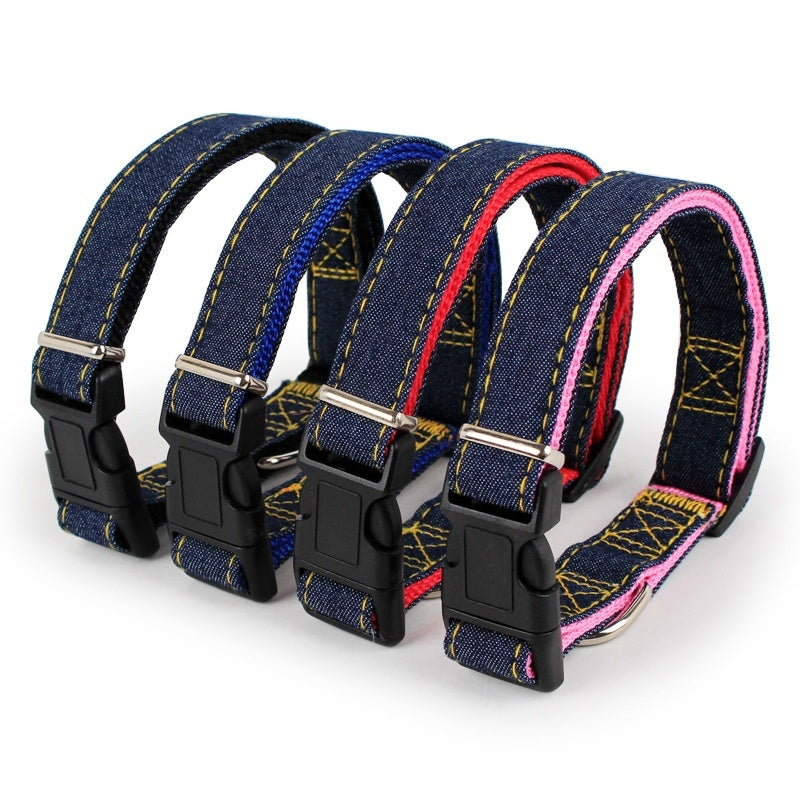 Denim dog harness set with black buckles and multicolor stitched straps