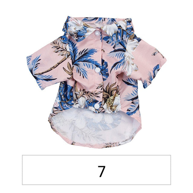 Hawaiian pet shirt, light pink with blue tropical leaf and animal prints, button front