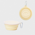 Yellow foldable pet travel bowl set with two stacked bowls and metal carabiner