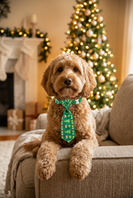Pet Christmas necktie in green with holiday pattern, tied at the front.