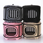 Four foldable pet carrier handbags in gray, pink, beige, and black with mesh windows
