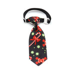 Black Christmas pet tie with candy cane and star patterns, clip-on strap