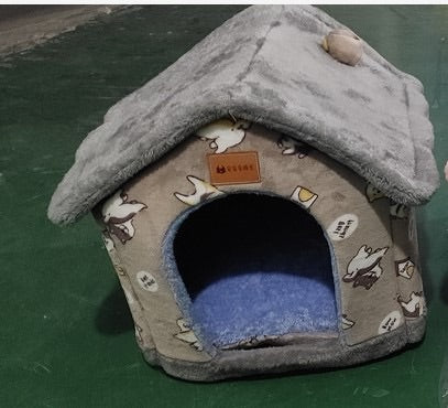 Gray plush pet house bed with dark round entrance and animal pattern fabric