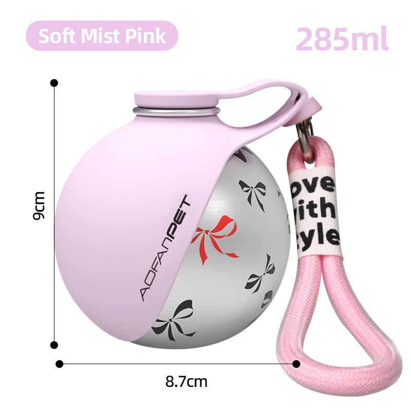Portable stainless steel pet water cup, pink with floral graphic and hanging loop