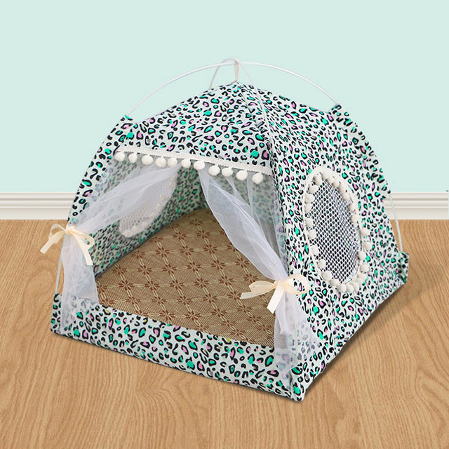 Leopard-print pet tent bed with open mesh curtains and round side fabric openings