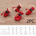 Red dog soft-soled pet shoes with paw-pull cords, black fasteners, set of 2.